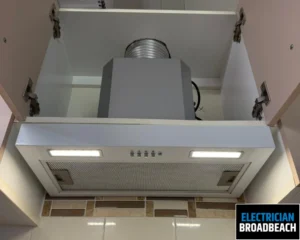 Close-up of a ceiling vent with air conditioning and lighting system.